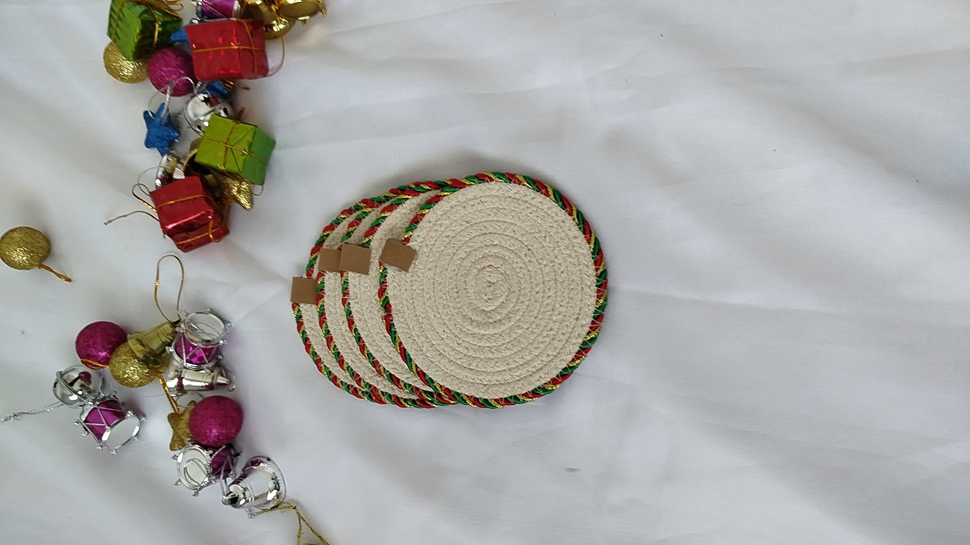 Set of white Christmas coasters