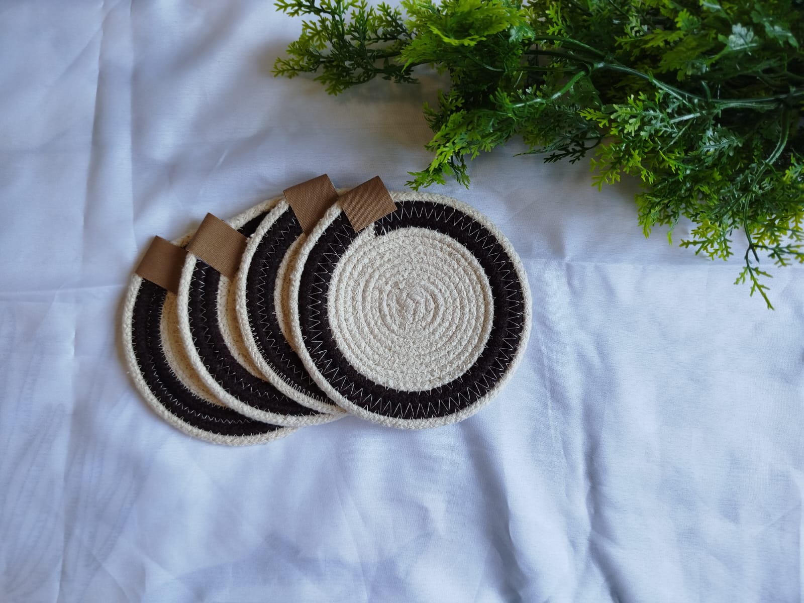 Set of 4 dark brown lining coasters 